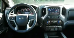 A close-up shot of interior accessories in a Chevy Silverado, including sleek dashboard accents, premium leather seats, and modern infotainment system